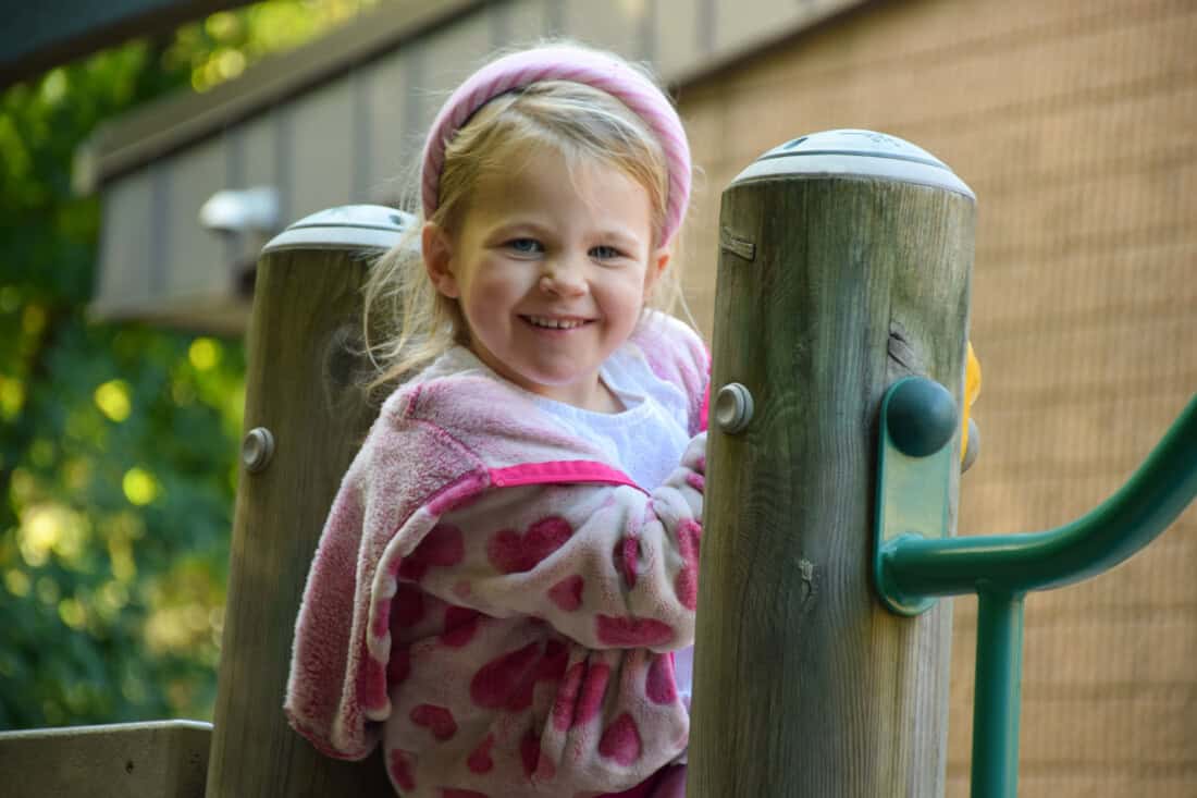 Girl on playground at the Hingham Early Learning Center.